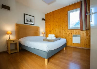 Photo d'une chambre lit double à la Résidence Val de Roland