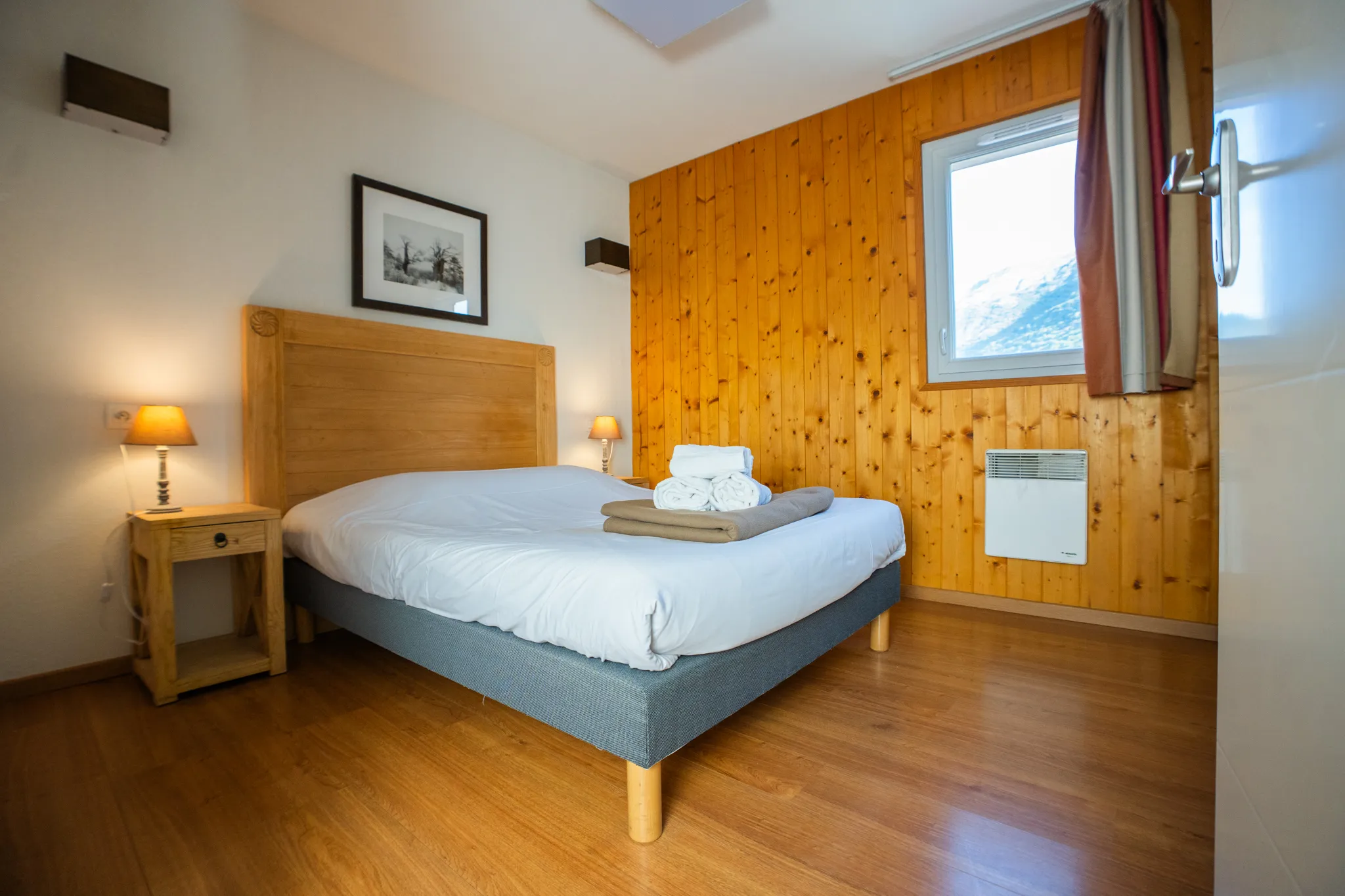 Photo d'une chambre lit double à la Résidence Val de Roland