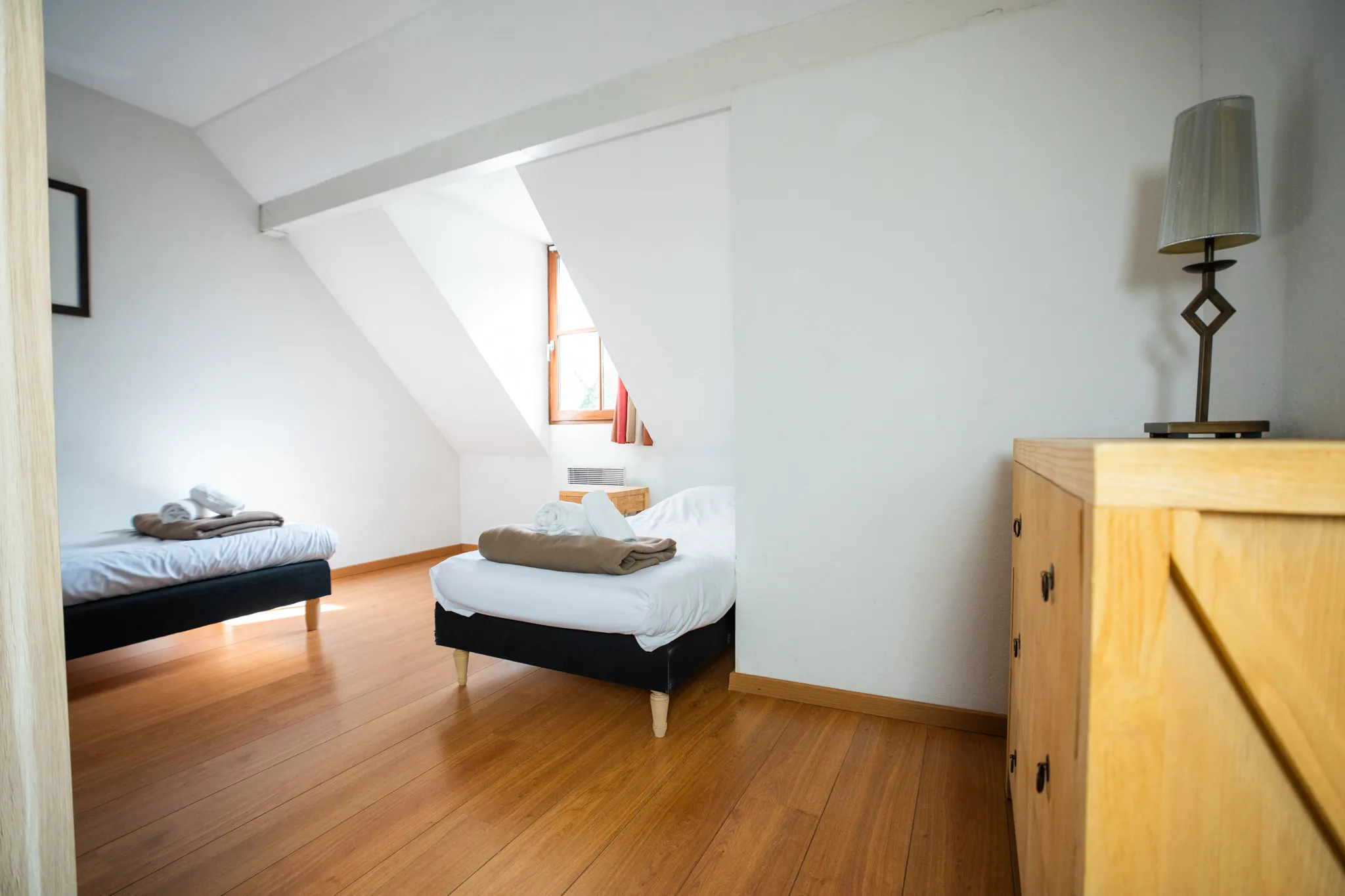 Chambre avec deux lits simples